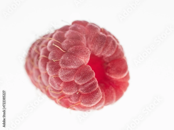 Obraz ripe, red raspberry close-up on a white background
