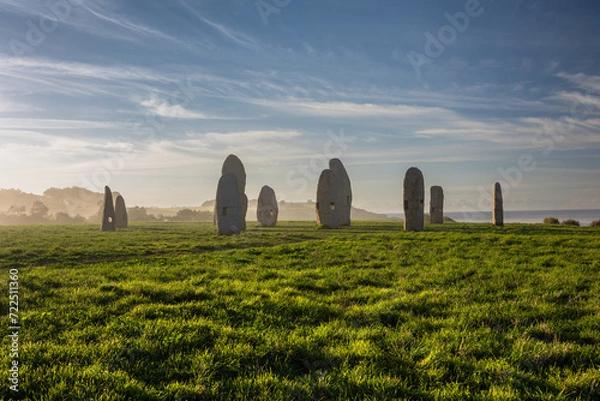 Obraz Misty Dawn at Coruna: The Menhirs' Silent Vigil