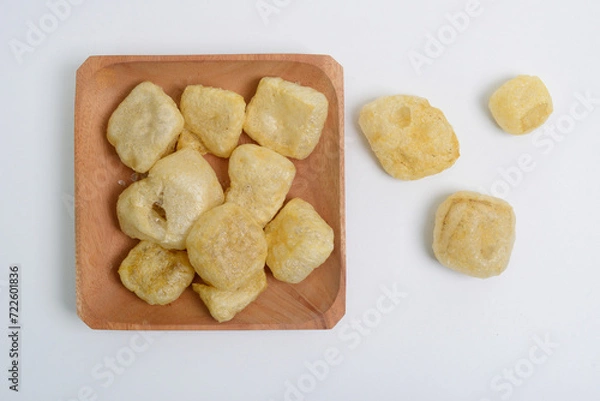 Fototapeta Leather crackers, some regions call them rambak or jangek, are crackers made from cow skin or buffalo skin which are processed with spices and flavor enhancers.