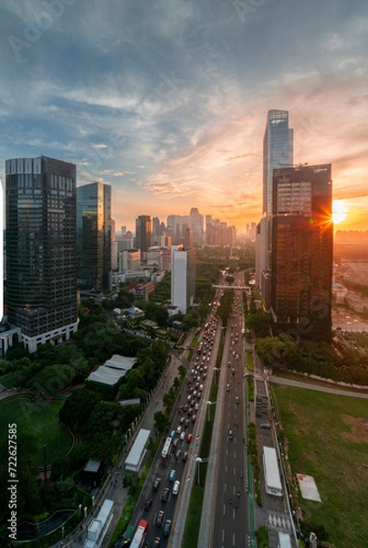 Fototapeta Panoramic view of jakarta City, Indonesia, with beautiful sunset. Jakarta is the largest city in indonesia that also the center of governance and business district. 