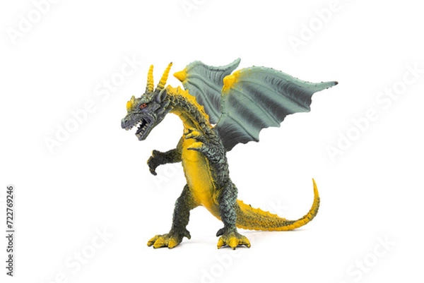 Fototapeta Plastic dragon toy on white background. The Simbol of new year 2024.