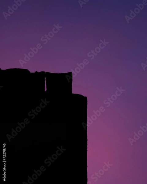 Obraz Atardecer de un tejado con cielo morado