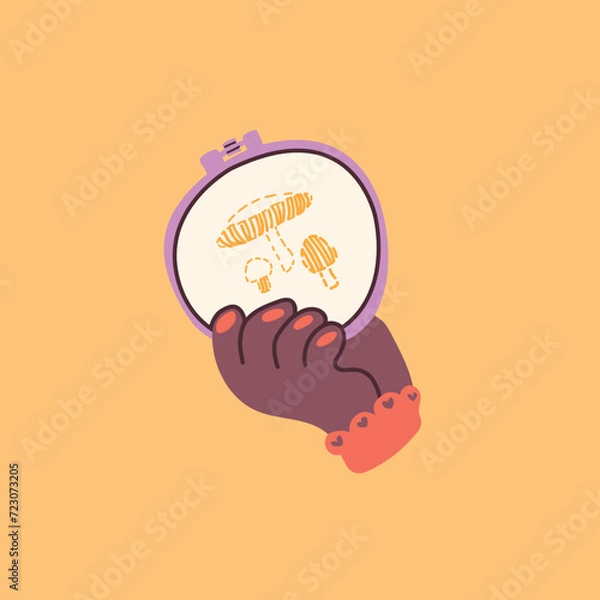 Fototapeta Vector cartoon illustration of a hand holding a hoop with embroidery on a bright red background. Element for the design of postcards, banners of hobby and creative shops. Modern Scandinavian style.