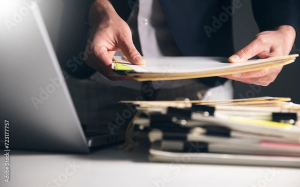 Obraz Business man hand document report paper