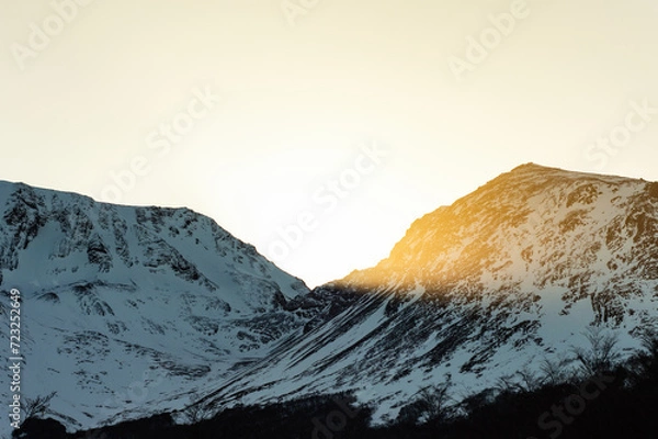 Obraz Stream of meltwater on the heights of a snowy mountain. Ushuaia Emerald Lagoon in winter