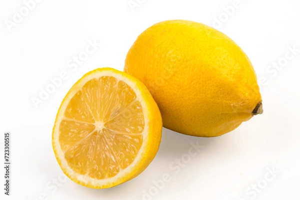 Fototapeta Lemon isolate on white. Lemon fruit whole and a half with leaves. Side view on white. With clipping path.