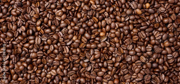 Fototapeta Scattered roasted coffee beans, full frame