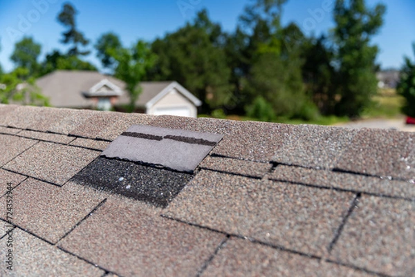 Obraz Roofing shingle damaged in storm