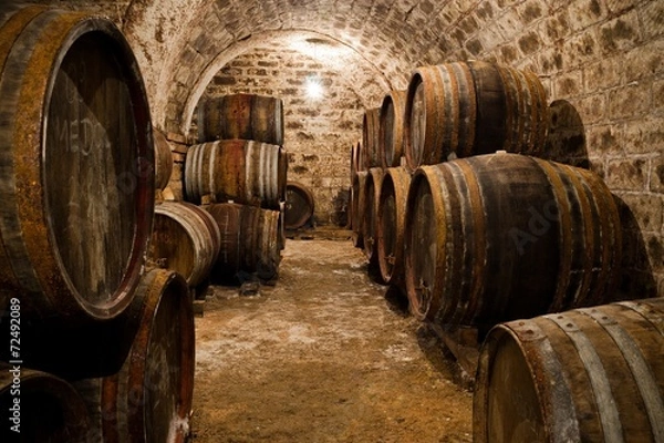 Obraz Barrels in a hungarian wine cellar