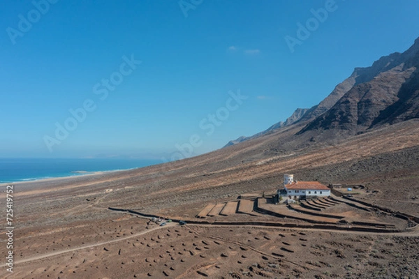 Fototapeta aerial view on a mansion at the coast of Fuerteventura