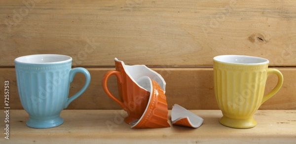 Obraz Three cups on wooden shelf