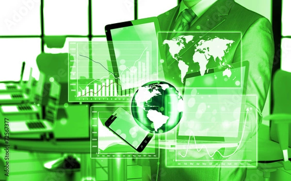 Fototapeta Technology in the hands of businessmen