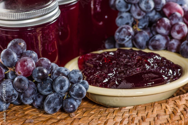 Obraz Grapes and bowl of grape jelly