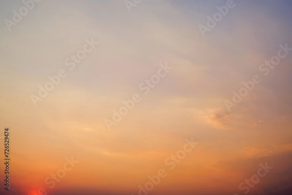Obraz Beautiful , luxury soft gradient orange gold clouds and sunlight on the blue sky perfect for the background, take in everning,Twilight, Large size, high definition landscape photo