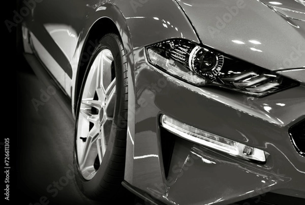 Fototapeta Front view of headlights modern sport car 