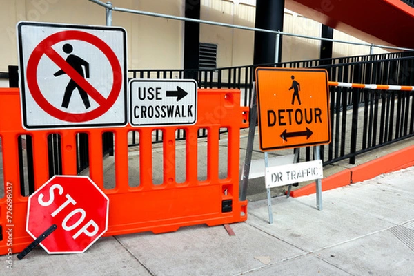 Fototapeta Sidewalk Closed signs for works. Stop and Detour signs