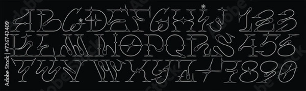 Fototapeta Y2K Girly Gothic Alphabet z kształtami gwiazd. Czcionka kwasowa. Modny projekt liczby i listu. Figurki blasku. Neotribal Emo Style. Fine Line i ostre krawędzie, inspirowane metalową muzyką