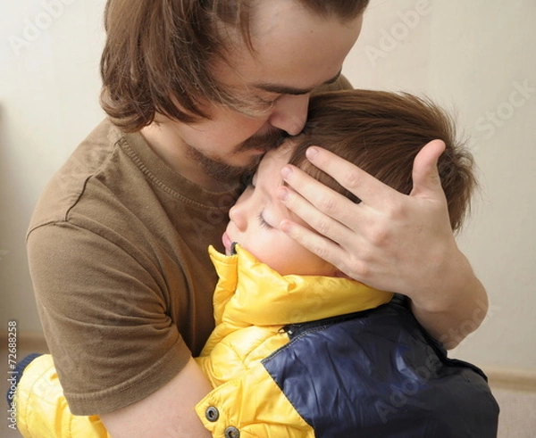 Fototapeta Father and son hugging together