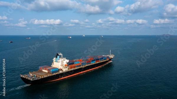 Obraz Aerial view container cargo ship maritime carrying container, Global business import export logistic freight shipping transportation international by container cargo ship, Container fright shipping.