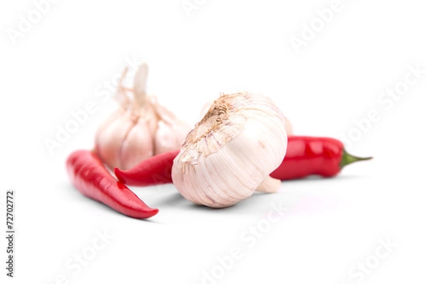 Fototapeta Chile peppers and garlic on a white background with a drop shado