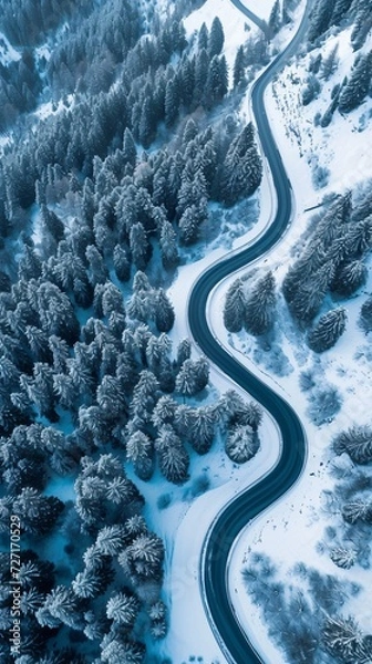 Fototapeta Aerial view of the winding Snake Road in winter in the Dolomite Alps of Italy