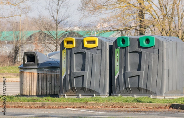 Fototapeta Large easy to remove recycling bins in a park in France