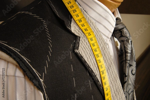 Obraz Tailor shop mannequin with measuring tape.