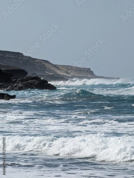 Obraz waves crashing on rocks
