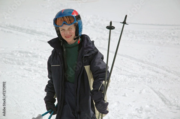 Fototapeta boy after a day skiing