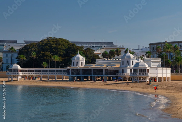 Obraz view of la caleta beach with white building of an old bathhouse in the spanish city cadiz