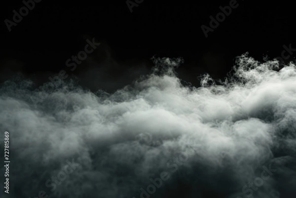 Fototapeta A black and white photo of a plane flying through the clouds. Suitable for travel and aviation themes