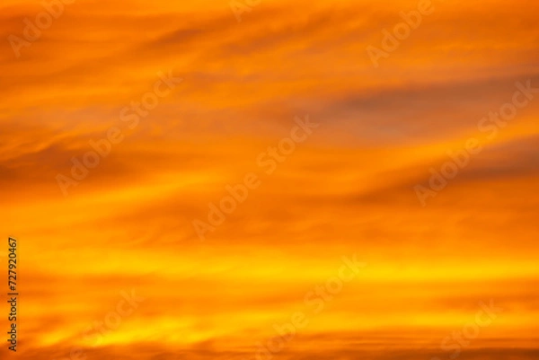 Obraz Bright orange evening sky background at sunset.
