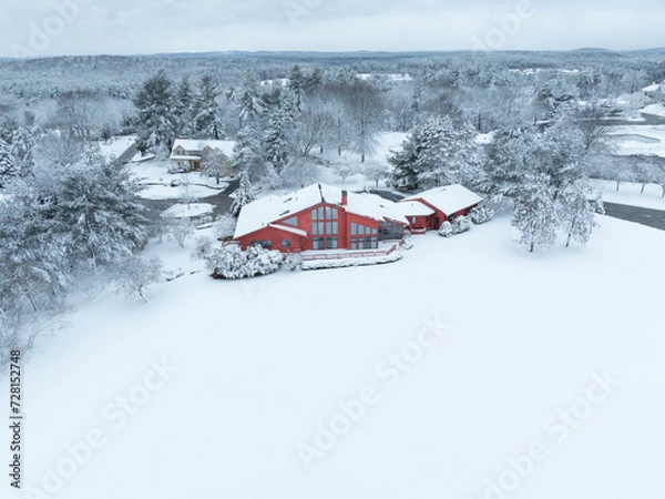 Obraz aerial view of rural scene with red club house after snow