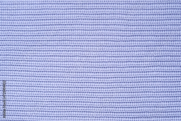 Fototapeta Blue knitted background from woollen yarns or cotton. Abstract texture of a knitted fabric surface.