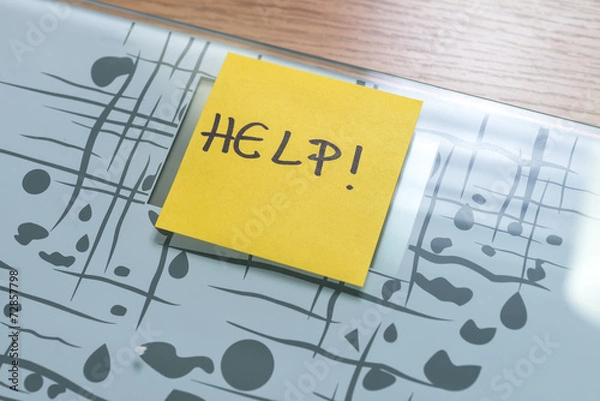 Fototapeta weight scale with yellow note