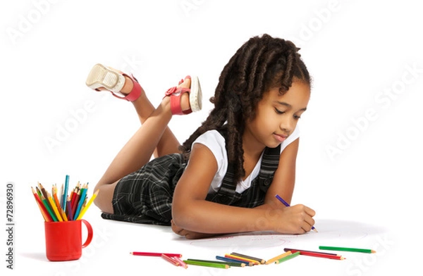 Obraz cheerful girl draws pencil lying on the floor
