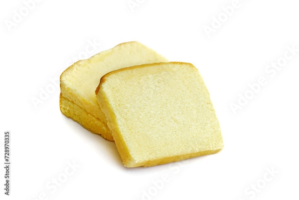 Obraz Butter cake sliced on white background