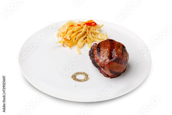 Fototapeta Filet mignon steak in a plate. Isolated.