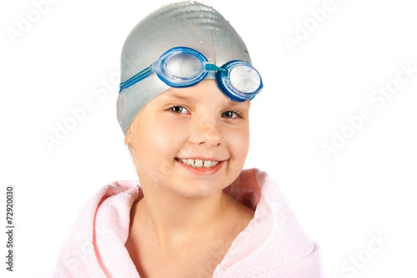 Obraz Portrait of a young girl in goggles and swimming cap. Isolated o