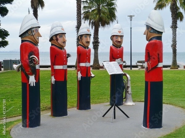 Fototapeta The humorous painted wood bollards at the waterfront of Geelong