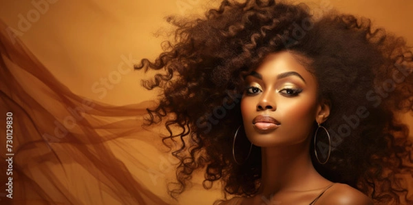 Obraz Close up of beautiful afro american woman with make up with curly hair. Beauty make up or skincare concept banner, brown gold background