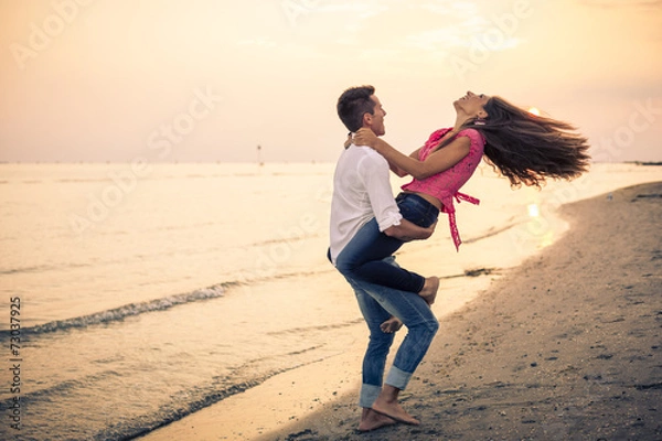 Obraz Beautiful Couple having fun on beach
