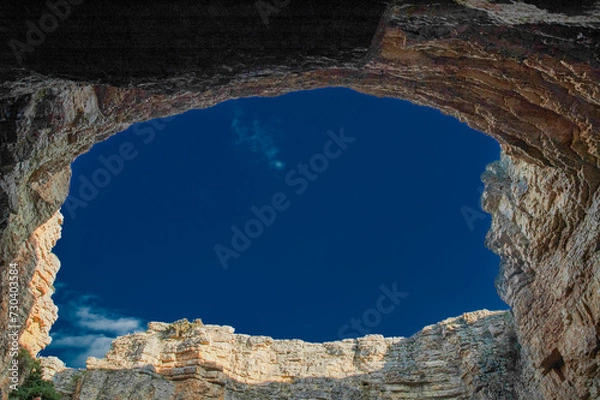 Fototapeta View from the cave to the sky in the celadons "Las Celadas" in Orihuela Tremedal, Teruel, Spain