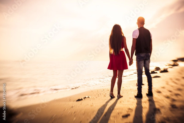 Obraz Beautiful Couple walking on beach