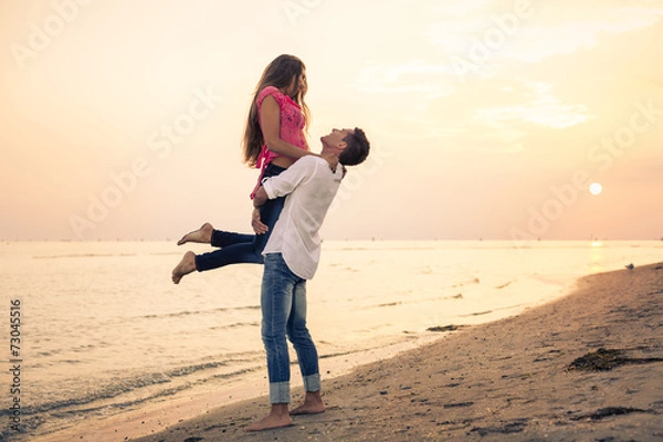 Obraz Beautiful Couple having fun on beach