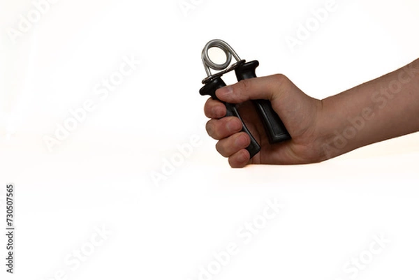 Obraz hand holding a hand grip on white background with copy space