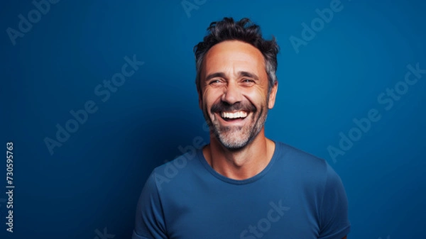 Obraz Happy smiling middle aged adult man on a solid background