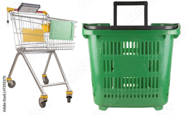 Obraz Empty green hand basket and a shopping troley