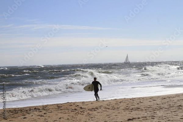 Fototapeta Surfer on St. augustine beach