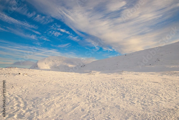 Obraz snowy mountain in Norway with clouds